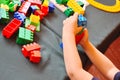 A little boy is playing with a colorful constructor. A child in kindergarten Royalty Free Stock Photo