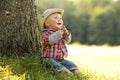 Little boy playing cowboy in nature Royalty Free Stock Photo