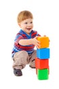 Little boy playing with cubes