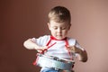 Little boy playing the drum. Child development concept. Royalty Free Stock Photo