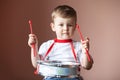 Little boy playing the drum. Child development concept. Royalty Free Stock Photo