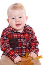 Little boy playing on the floor with maple leaves. Royalty Free Stock Photo