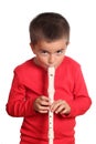 Little boy playing the flute Royalty Free Stock Photo