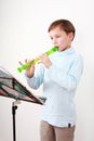 Little boy playing flute Royalty Free Stock Photo