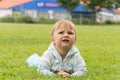 Little boy playing on the football field with gates Royalty Free Stock Photo