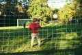 Little boy playing football with his father Royalty Free Stock Photo