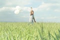 Little boy playing free in the meadow