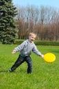 Little boy is playing Frisbee Royalty Free Stock Photo