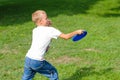 Little boy playing frisbee Royalty Free Stock Photo