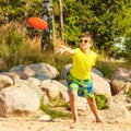 Little boy playing with frisbee disc. Royalty Free Stock Photo