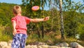 Little boy playing with frisbee disc. Royalty Free Stock Photo