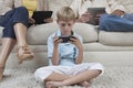 Little Boy Playing Games On PSP