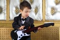 A little boy playing guitar Royalty Free Stock Photo