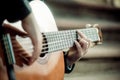 Little boy playing guitar close-up Royalty Free Stock Photo