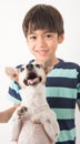 Little boy playing with his friend dog jack russel on white Royalty Free Stock Photo