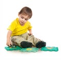 Little boy playing letters Royalty Free Stock Photo