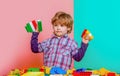 Little boy playing with lots of colorful plastic blocks constructor. Boy playing with construction blocks at Royalty Free Stock Photo