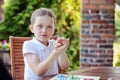 Little boy playing ludo board game