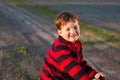 Little boy playing outdoors Royalty Free Stock Photo