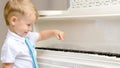 Little boy playing the piano Royalty Free Stock Photo