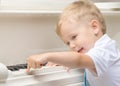 Little boy playing the piano Royalty Free Stock Photo