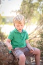 Little boy playing at preschool with serious expression Royalty Free Stock Photo