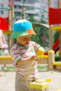 Little boy playing in sandbox Royalty Free Stock Photo