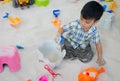 Little boy playing in a sandbox. Royalty Free Stock Photo