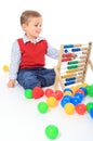 Little boy playing with sliderule Royalty Free Stock Photo