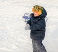 Little boy playing in the snow Royalty Free Stock Photo