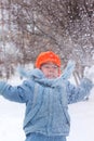 Little boy playing snowballs Royalty Free Stock Photo