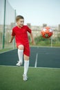 Little Boy Playing Soccer. Sport kid. Child with Ball