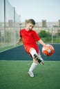 Little Boy Playing Soccer. Sport kid. Child with Ball