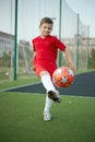 Little Boy Playing Soccer. Sport kid. Child with Ball