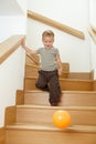 Little boy playing on stairs Royalty Free Stock Photo