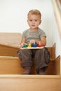 Little boy playing on stairs Royalty Free Stock Photo