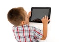 Little boy playing on tablet PC