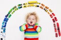 Little boy playing with toy cars. Toys for kids. Royalty Free Stock Photo