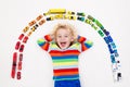 Little boy playing with toy cars. Toys for kids. Royalty Free Stock Photo