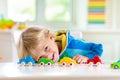 Boy playing toy cars. Kid with toys. Child and car Royalty Free Stock Photo