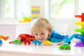 Boy playing toy cars. Kid with toys. Child and car Royalty Free Stock Photo