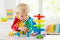 Boy playing toy cars. Kid with toys. Child and car Royalty Free Stock Photo