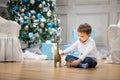 Little boy playing with a toy dinosaur Royalty Free Stock Photo