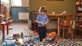 little boy is playing with toys in the room Royalty Free Stock Photo