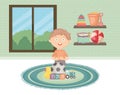 Little boy playing with toys in the room Royalty Free Stock Photo