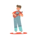 Little boy playing ukulele guitar. Small kid play on acoustic guitar music instrument Royalty Free Stock Photo