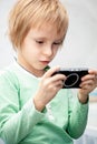 A boy playing a video game on his game console Royalty Free Stock Photo