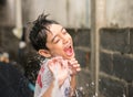 Little boy playing water splash over face Royalty Free Stock Photo