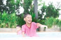 Little boy playing water at swimming pool in the hotel Royalty Free Stock Photo