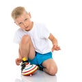 Little boy playing with a whirligig. Royalty Free Stock Photo